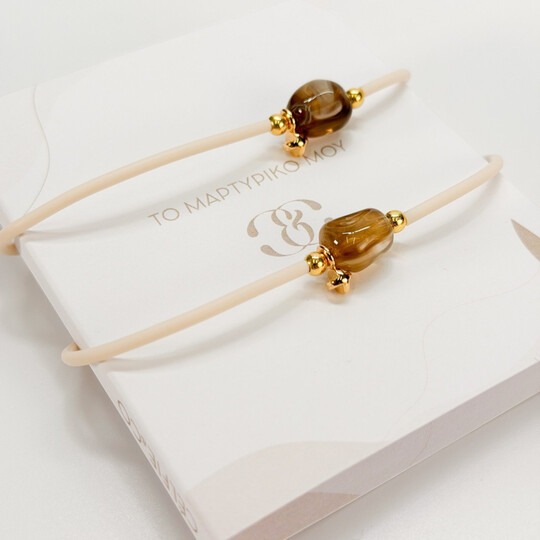 Μαρτυρικό Βραχιόλι Celfie & Co J-7 | Εκρού Καουτσούκ, Καφέ Ακρυλική Πέτρα & Επιχρυσωμένος Σταυρός